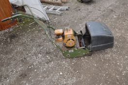 A VINTAGE WEBB AB1474 PETROL CYLINDER MOWER with a Briggs and Stratton 2 hp motor ( engine pulls