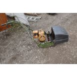 A VINTAGE WEBB AB1474 PETROL CYLINDER MOWER with a Briggs and Stratton 2 hp motor ( engine pulls