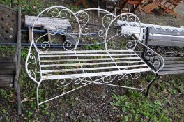 A METAL GARDEN BENCH with round bar frame and metal slatted seat, width 143cm