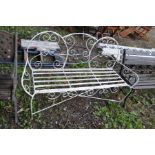 A METAL GARDEN BENCH with round bar frame and metal slatted seat, width 143cm