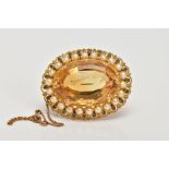 A LARGE CITRINE, PEARL AND EMERALD OVAL BROOCH, a large faceted citrine measuring approximately 29.