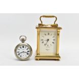A BRASS CARRIAGE CLOCK AND A MILITARY POCKET WATCH, a white enamel face with black Roman numerals,
