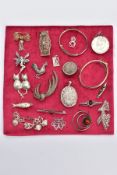 A SELECTION OF SILVER AND WHITE METAL JEWELLERY, to include two child's bangles, a Danish circular