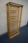 TWO STACKABLE PINE BED FRAMES with slats, width 92cm x length 197cm x height for each 25cm x stacked