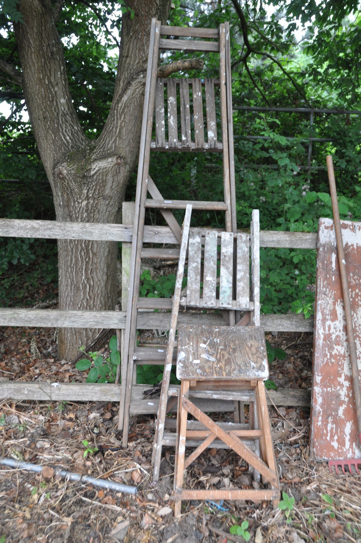 THREE WOODEN STEP LADDERS the tallest being 196cm high
