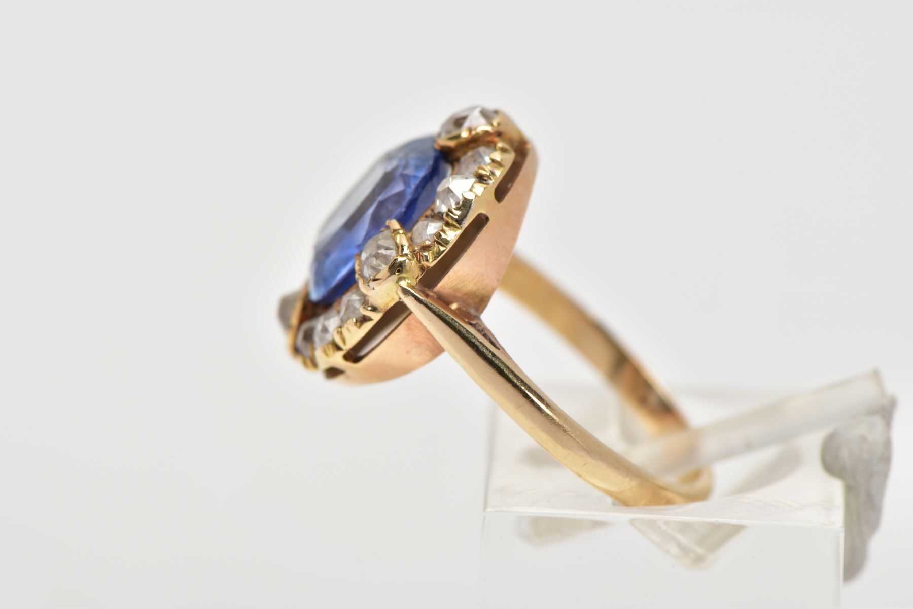 A GOLD VICTORIAN DIAMOND AND SAPPHIRE CLUSTER RING, a large cushion cut pale blueish purple sapphire - Image 2 of 4