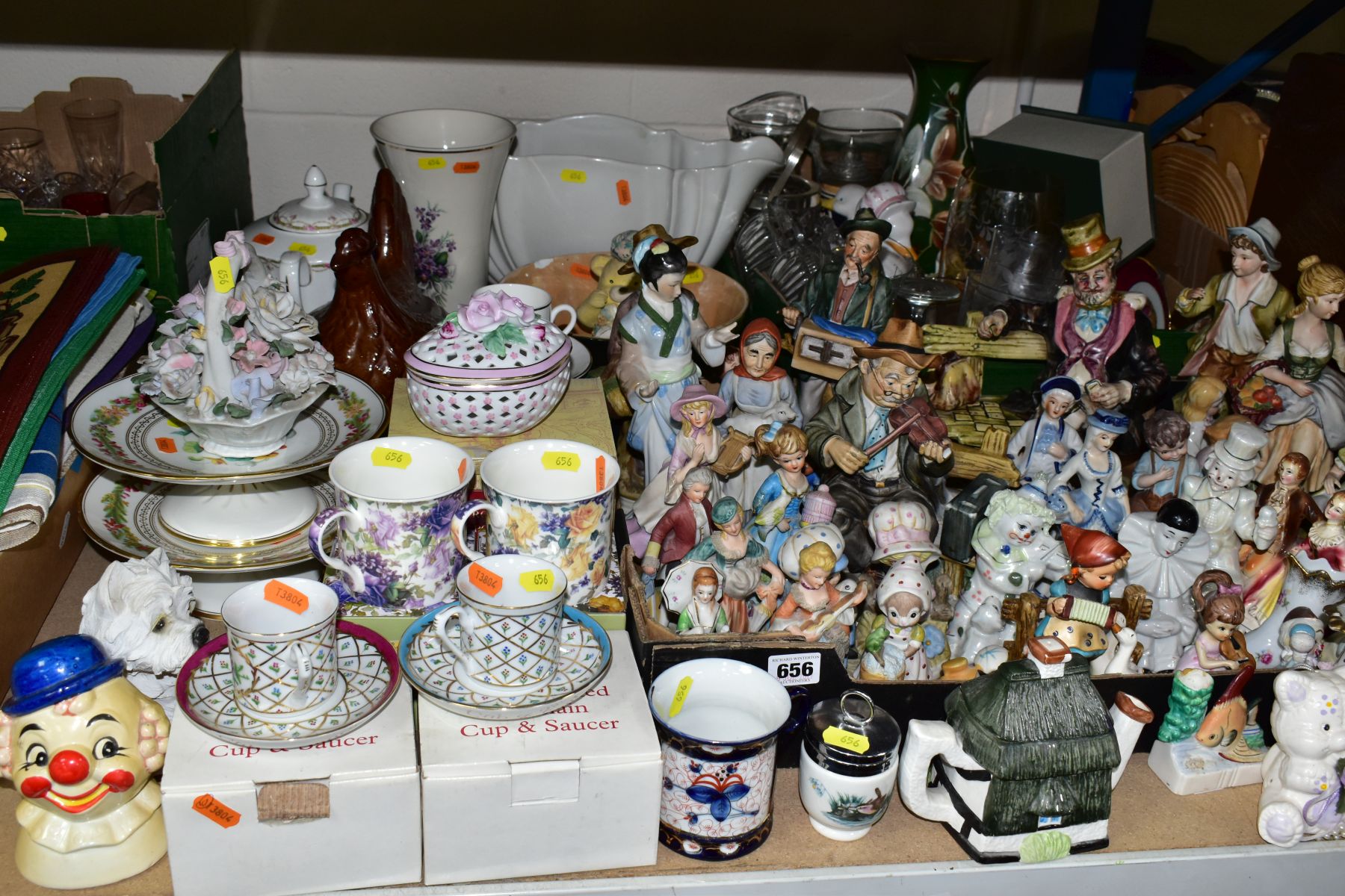 TWO BOXES AND LOOSE 20TH CENTURY FIGURAL ORNAMENTS, boxed tea cups and saucers, a pair of