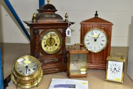 FIVE ASSORTED CLOCKS, comprising two quartz carriage clocks (Westclox and H. Samuel), a late 19th