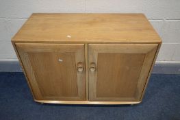 AN ERCOL WINDSOR TWO DOOR CABINET, with two shelves and a sliding cutlery drawer width 91cm x