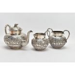 A THREE PIECE CONTINENTAL TEA SERVICE, comprising a teapot, milk jug and sugar bowl, all with