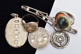 SIX ITEMS, to include a operculum shell ring, an oval silver pendant, a George IV 2 shilling south