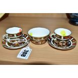 ROYAL CROWN DERBY MINIATURE TEAWARES, '1128' pattern, comprising of two tea cups both XLVII, one