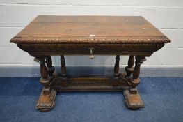 A 19TH CENTURY CARVED OAK CENTRE TABLE, rectangular top above a tapered frieze containing a long