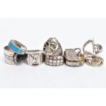 NINE RINGS, to include an inlaid mother of pearl ring, a skull ring, a Claddagh ring etc., many with
