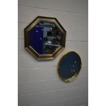 A MODERN OCTAGONAL BEVELLED EDGE WALL MIRROR, and another mirror (2)