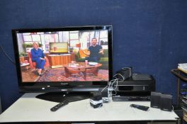 A PANASONIC TH-42PX70B 42in TV with remote and a Panasonic SA-PT450 Home Theatre system with remote,