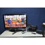 A PANASONIC TH-42PX70B 42in TV with remote and a Panasonic SA-PT450 Home Theatre system with remote,