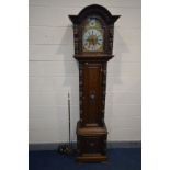 A LATE 19TH/EARLY 20TH CENTURY OAK EIGHT DAY LONGCASE CLOCK, the hood with an arched glazed door
