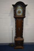 A LATE 19TH/EARLY 20TH CENTURY OAK EIGHT DAY LONGCASE CLOCK, the hood with an arched glazed door