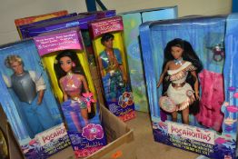 TWO BOXES OF DISNEY AND BARBIE FIGURES IN UNOPENED BOXES, comprising Aladdin and Jasmine, Pocahontas