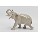 A MID 20TH CENTURY RUSSIAN CERAMIC MODEL OF A BULL ELEPHANT, grey gloss, red printed mark, height