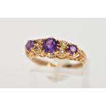 A 9CT GOLD AMETHYST AND DIAMOND HALF HOOP RING, three round cut amethysts graduating in size with