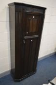 AN OAK LINENFOLD HALL ROBE, 80cm x depth 41cm x height 186cm