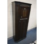 AN OAK LINENFOLD HALL ROBE, 80cm x depth 41cm x height 186cm