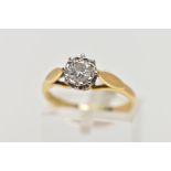 AN 18CT GOLD DIAMOND SINGLE STONE RING, an illusion set diamond to petal shoulders and a plain D