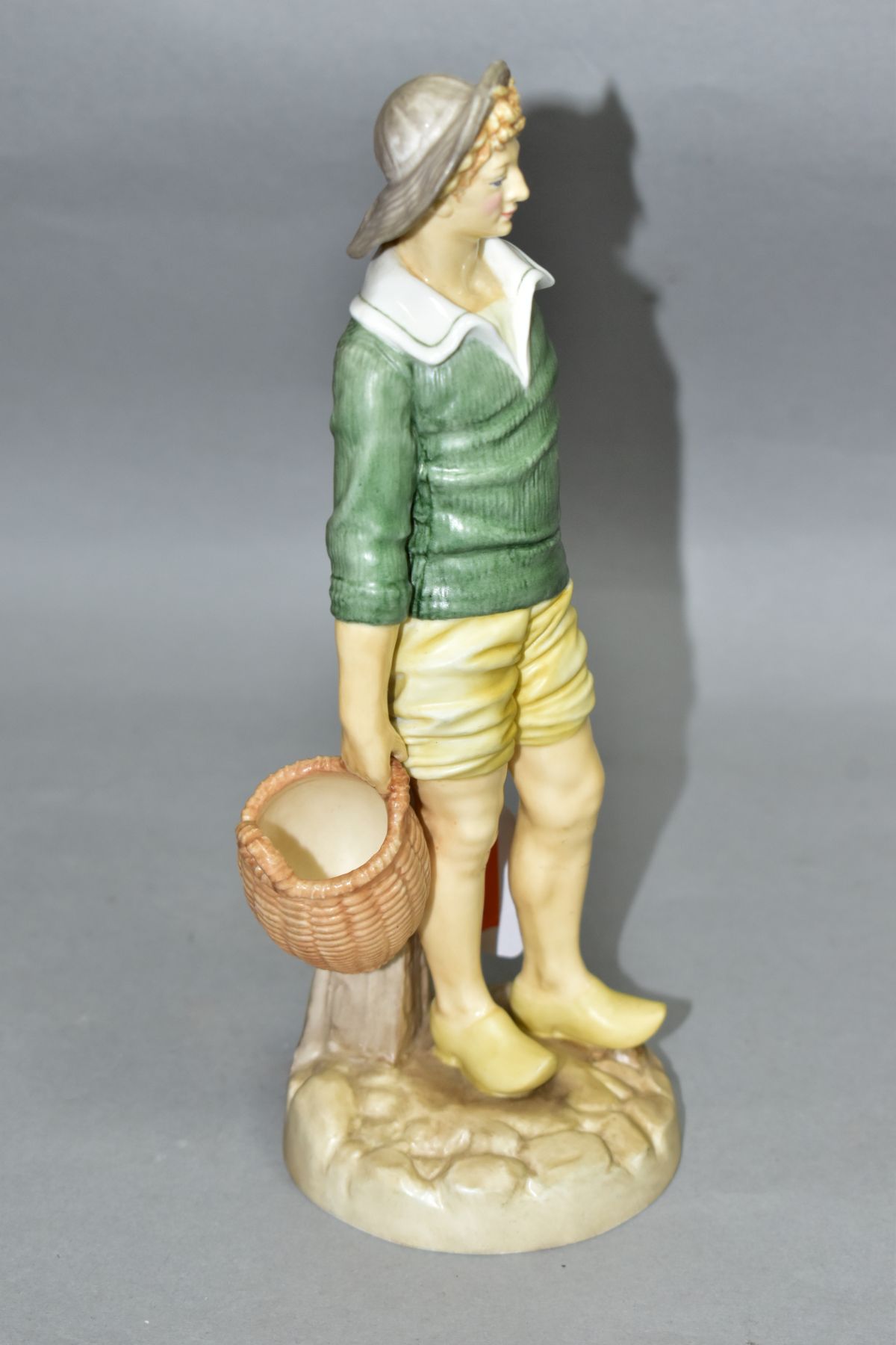 A ROYAL WORCESTER FIGURE FROM THE HADLEY COLLECTION, 'French Fisherboy', height 21cm (condition: - Image 3 of 4
