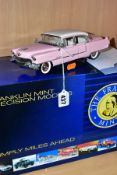 A BOXED FRANKLIN MINT ELVIS PRESLEY'S 1955 PINK CADILLAC FLEETWOOD, appears complete with replica