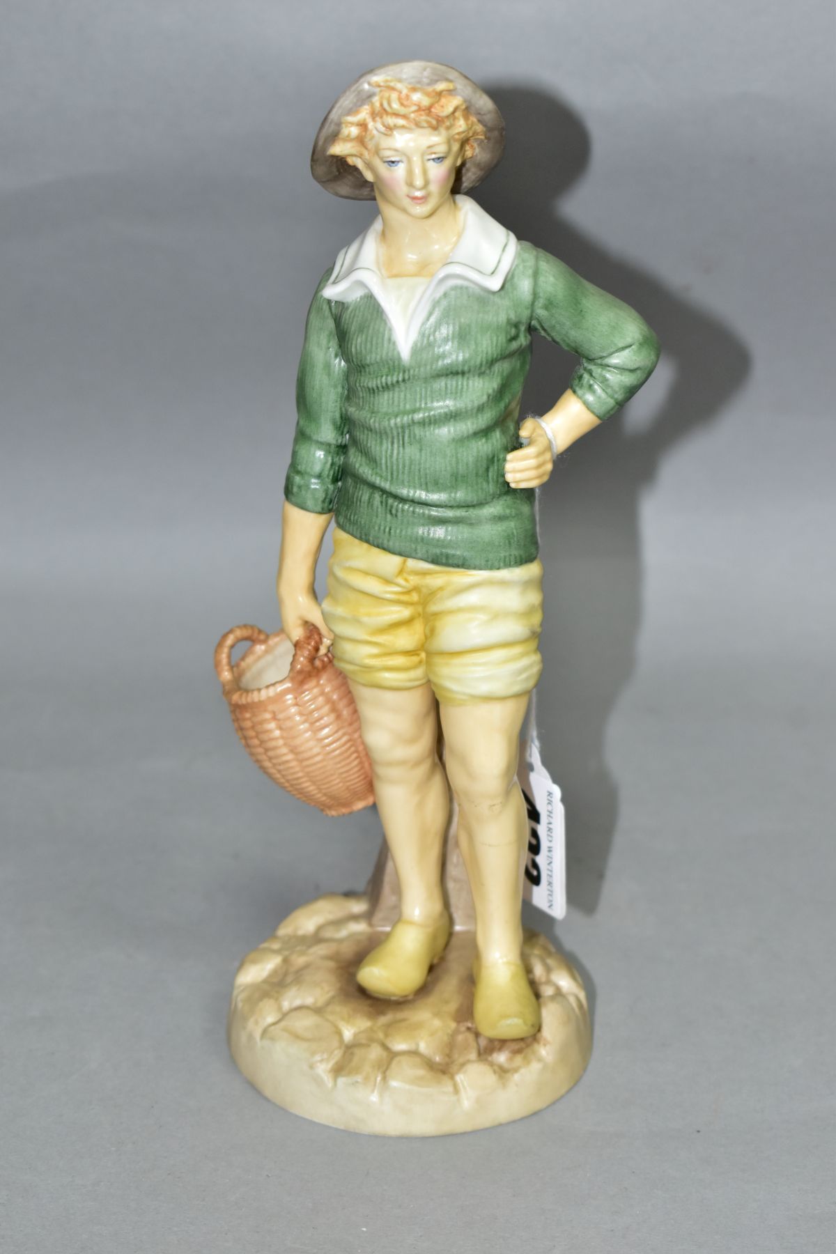 A ROYAL WORCESTER FIGURE FROM THE HADLEY COLLECTION, 'French Fisherboy', height 21cm (condition: