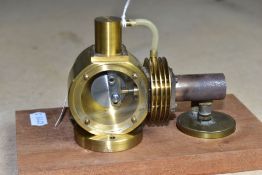 A HANDBUILT BRASS MODEL OF A HOT AIR ENGINE, not tested but shows signs of being run, constructed