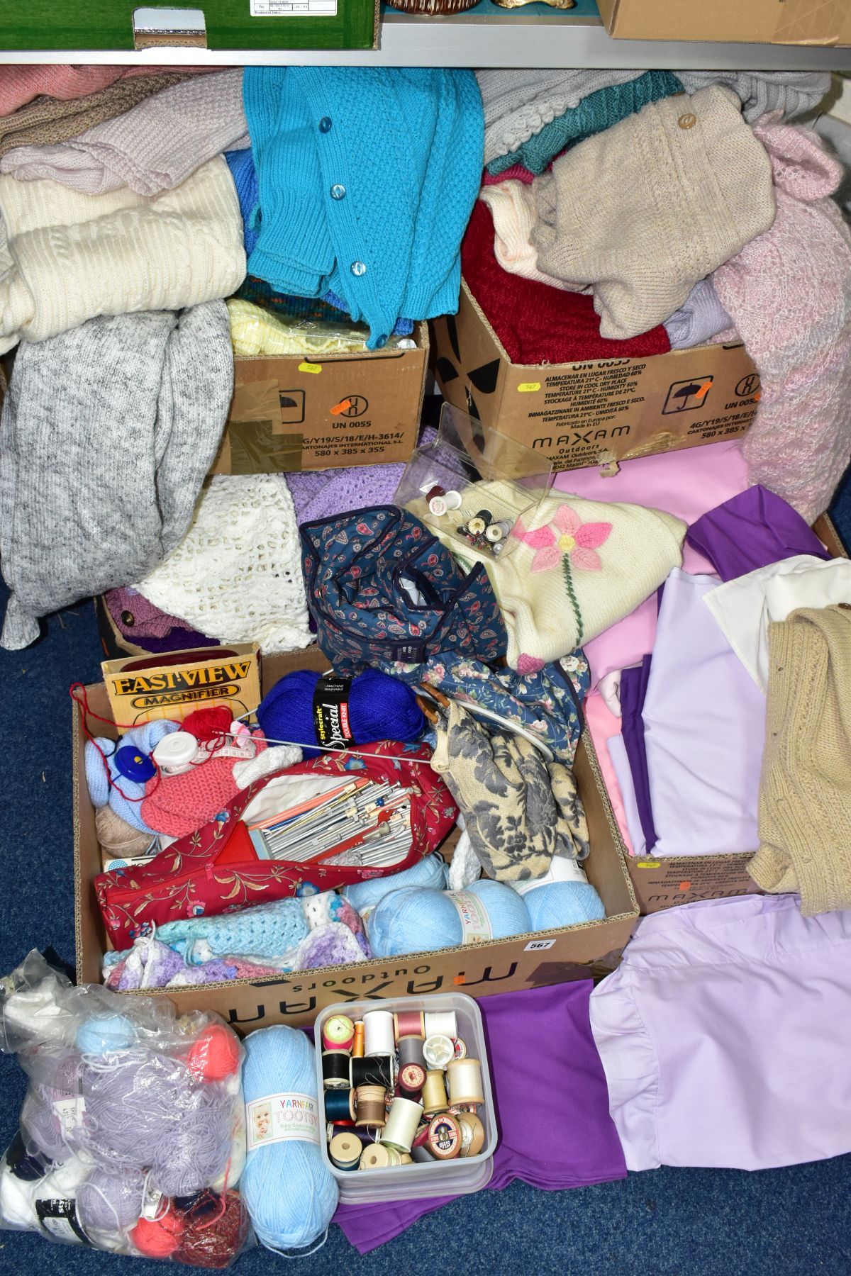FIVE BOXES OF WOOL, KNITTING NEEDLES, BEDDING AND KNITWARE, the knitware looks to be homemade, the
