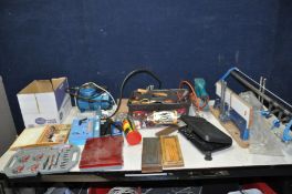 A TRAY CONTAINING HANDTOOLS AND A MINI COMPRESSOR (untested) including a multimeter, screwdrivers,