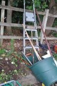 AN ALUMINIUM STEP LADDER, height 160cm and a selection of garden tools including a wheeled refuse