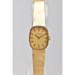 A 9CT GOLD LADY'S RENET WRISTWATCH. A cushion shape case measuring approximately 21.0mm x 18mm,