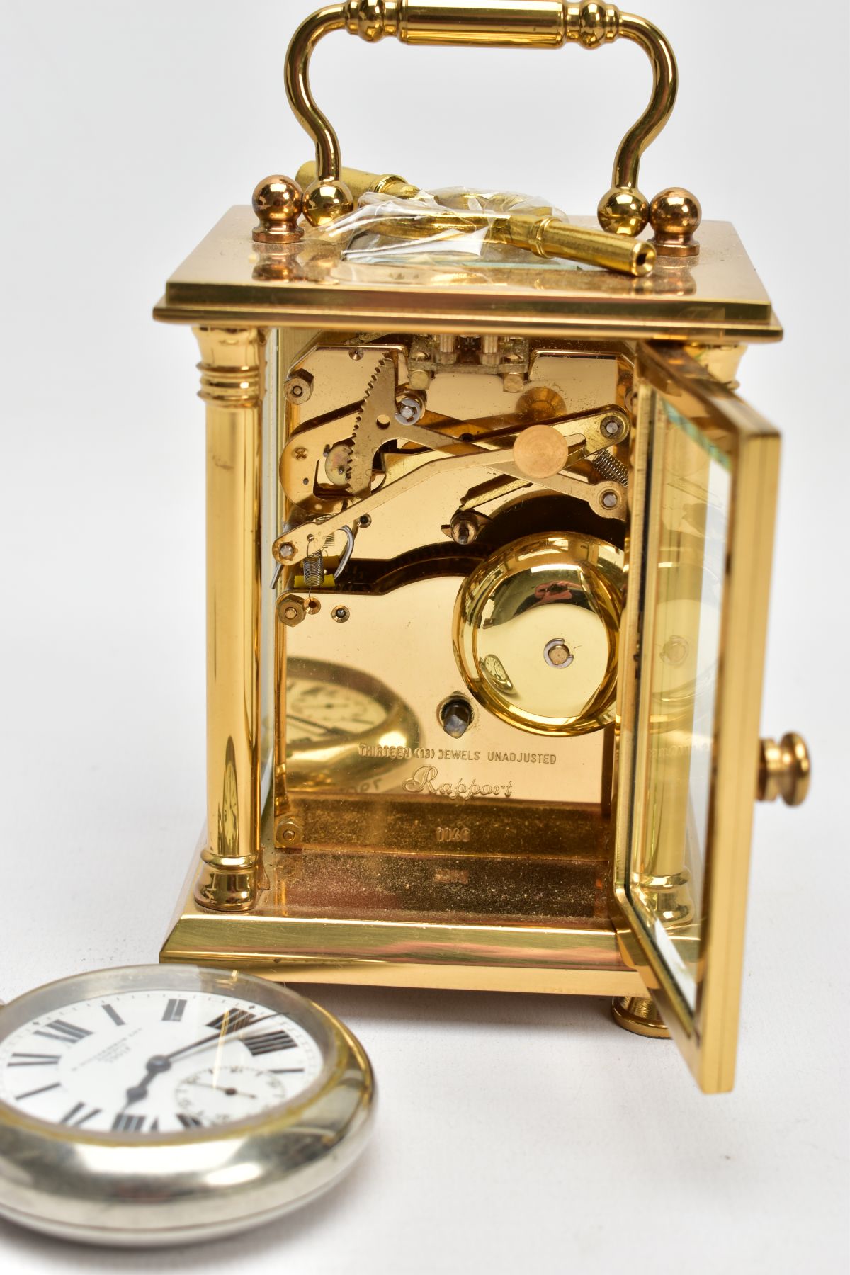 A BRASS CARRIAGE CLOCK AND A MILITARY POCKET WATCH, a white enamel face with black Roman numerals, - Image 5 of 7