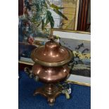 A COPPER SAMOVAR, with twin handles, brass front pouring tap, on four footed square base,