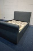 A SLATE GREY UPHOLSTERED 4FT6 BEDSTEAD with drawers (with bolts and like new condition)