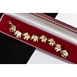 A 9CT ELEPHANT PANEL BRACELET, approximate weight 18.7 grams