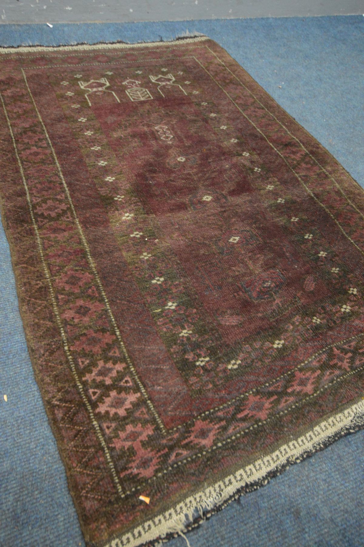 A SILK AND COTTON KAYSERI RUG, 137cm x 92cm, a similar red rug, and another rug (3) - Image 5 of 5