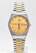 A STAINLESS STEEL RADO VOYAGER AUTOMATIC WRISTWATCH, champagne dial, clear stone dot markers, day-