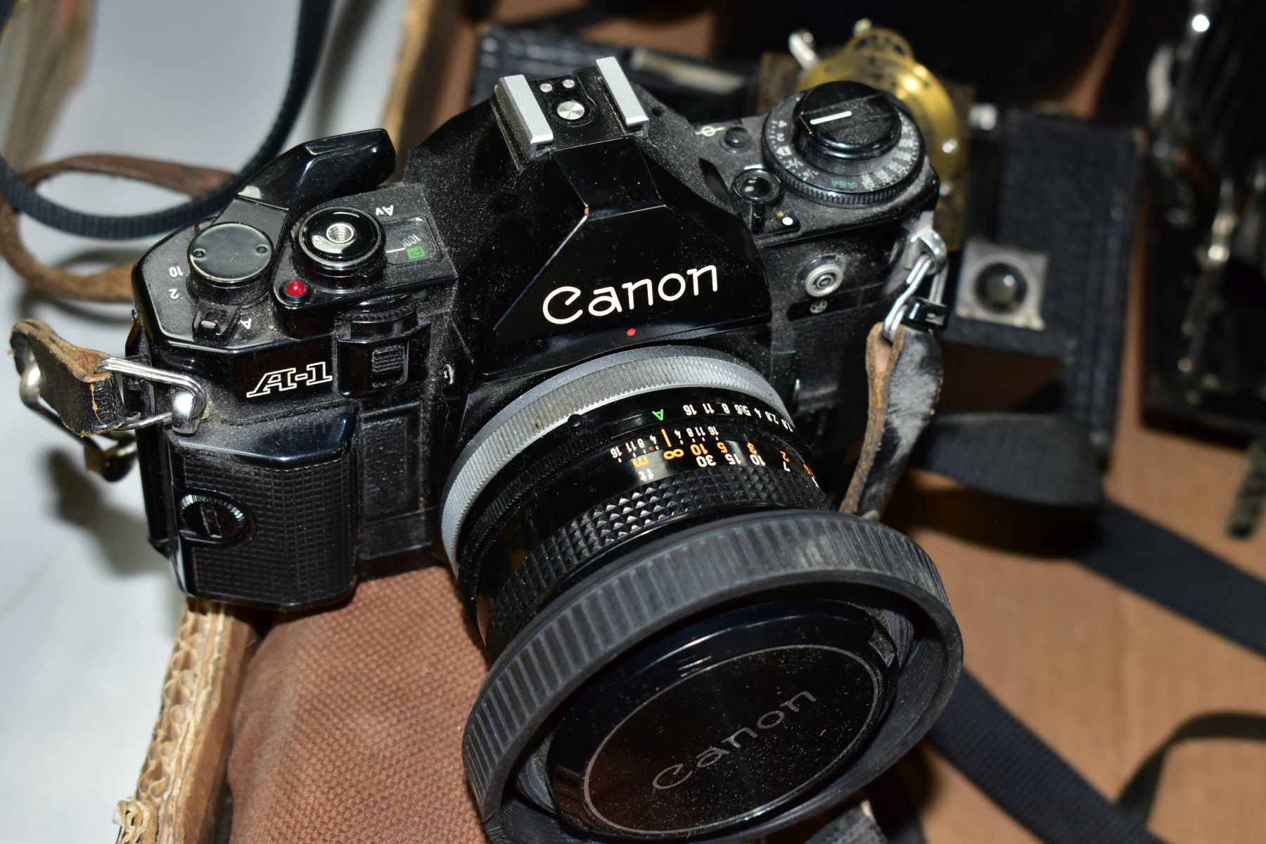 PHOTOGRAPHIC EQUIPMENT, ETC, comprising a Canon A1 SLR camera body fitted with a Canon FD 50mm f1. - Image 9 of 12