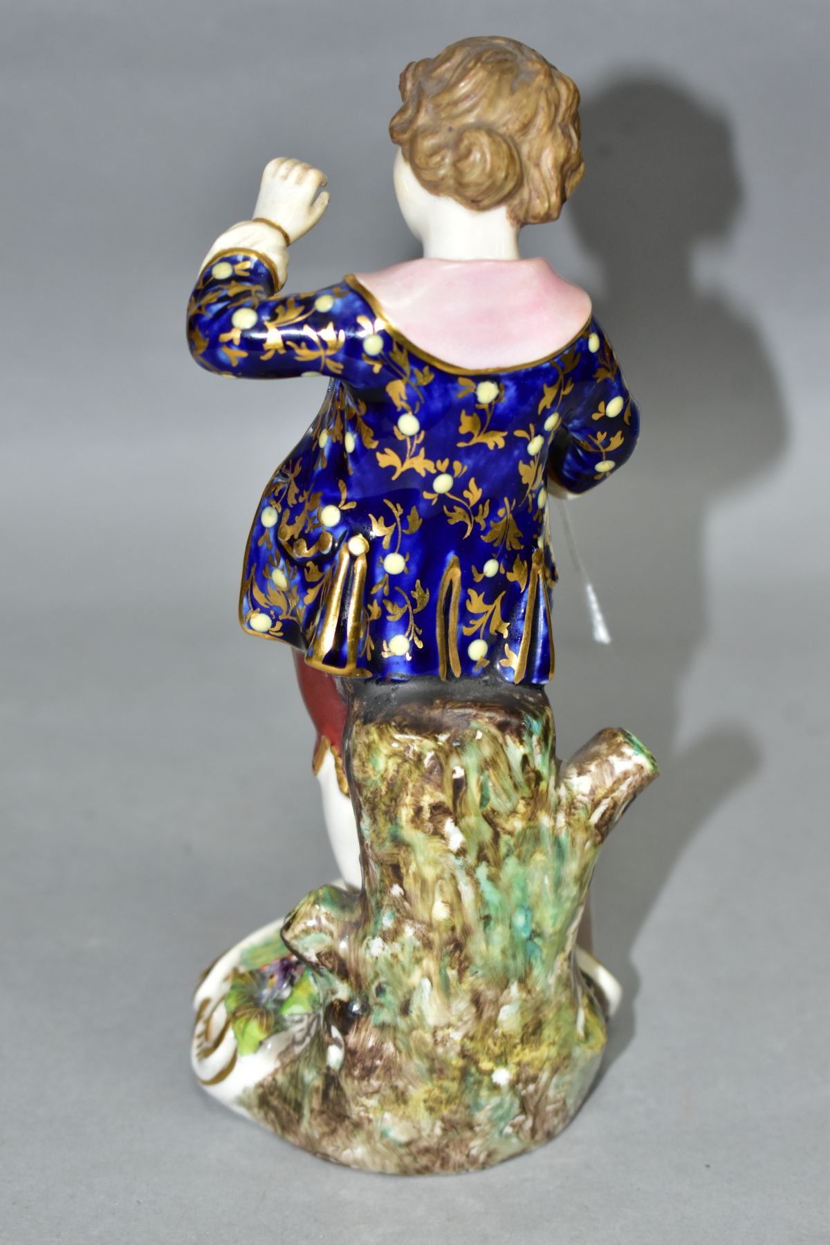 A STEVENSON & HANCOCK DERBY PORCELAIN FIGURE OF A BOY, modelled with a terrier standing on his knee, - Image 3 of 4