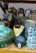 A GROUP OF STUDIO/STONEWARE POTTERY, mostly by Eileen Higgins, to include slab vases, baluster