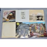 A SMALL BOX OF RECORDS, to include two picture discs by The Beatles, Abbey Road and Sergeant Pepper,