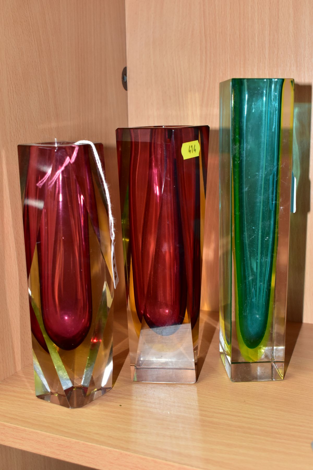 THREE MURANO CASED GLASS VASES, comprising two geometric vases with clear and yellow over red, one - Image 3 of 3