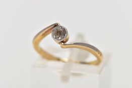 AN EARLY 20TH CENTURY DIAMOND SINGLE STONE CROSSOVER RING, estimated old cut diamond weight 0.