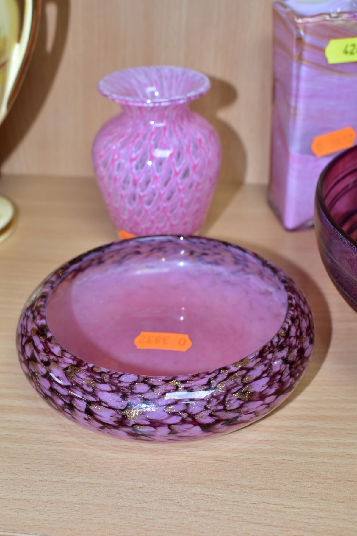 AN ALISTAIR MALCOLM STUDIO GLASS FOOTED BOWL AND THREE OTHER PIECES OF PINK RED GLASSWARE, the - Image 3 of 10